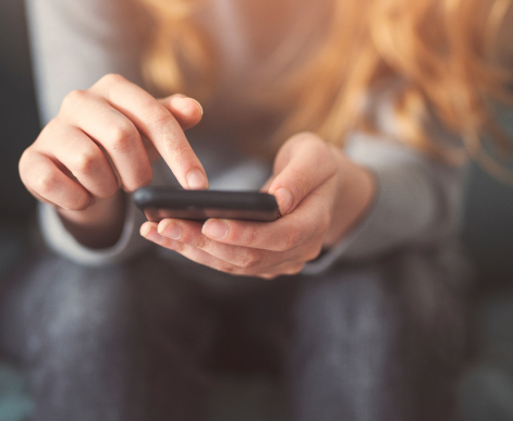 Person using phone for self assessment